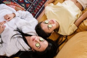 Girls relaxing with cucumbers on eyes 300x199 - Girls relaxing with cucumbers on eyes