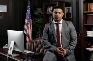 Lawyer posing in a law office 300x199 - Lawyer posing in a law office