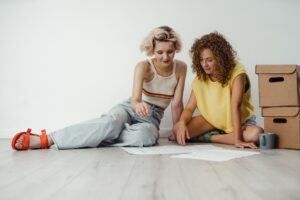 Women sitting down on floor 300x200 - Women sitting down on floor