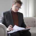 Home Lawyer reading files 2 150x150 - Home