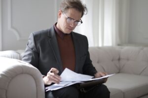Lawyer reading files 2 300x200 - Lawyer reading files (2)