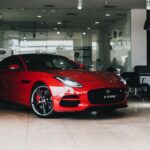 Home red sports car in showroom 150x150 - Home