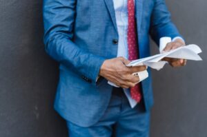 Man reading documents 300x199 - Man reading documents