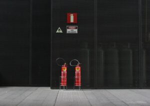 Pair of Red Fire Extinguisher Tanks 300x212 - Pair of Red Fire Extinguisher Tanks