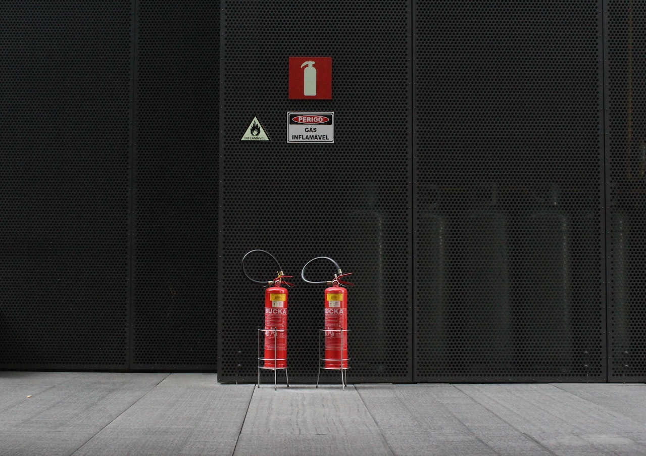 Pair of Red Fire Extinguisher Tanks - Electrical Safety at Home: Advice from Professional Electricians