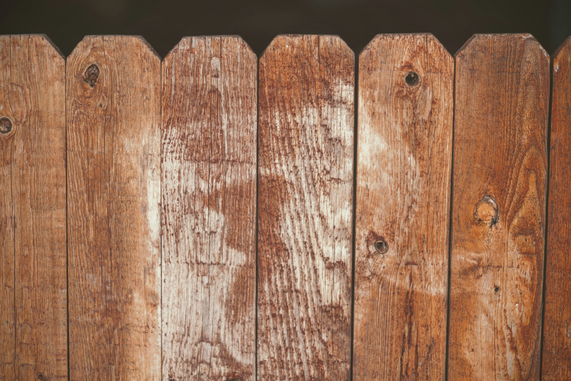 faded wooden fencing - 9 Purposes of Fencing for Your Home