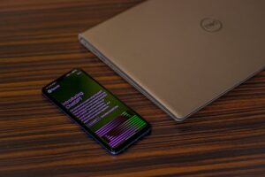 phone beside laptop opened to chatgpt homepage 300x200 - phone beside laptop opened to chatgpt homepage
