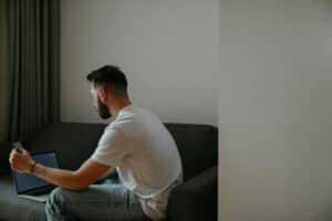 a man holding a credit card for an online purchase 300x200 - a man holding a credit card for an online purchase.jpg