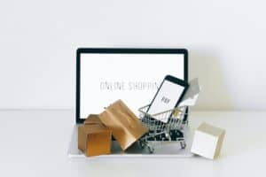 a miniature shopping cart on macbook laptop 300x200 - a miniature shopping cart on macbook laptop.jpg