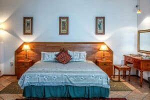 white bed cover near wall 300x200 - white bed cover near wall.jpg