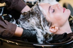 womans hair being washed in a salon 300x201 - woman's hair being washed in a salon