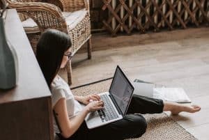 a woman typing in a laptop 300x201 - a woman typing in a laptop
