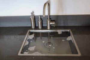 overflowing kitchen sink 300x200 - overflowing kitchen sink