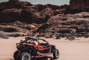 black and red UTV on desert 300x201 - black and red UTV on desert