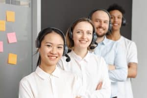 call center agents smiling 300x201 - call center agents smiling