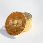 Home stack of pure gold coins 150x150 - Home