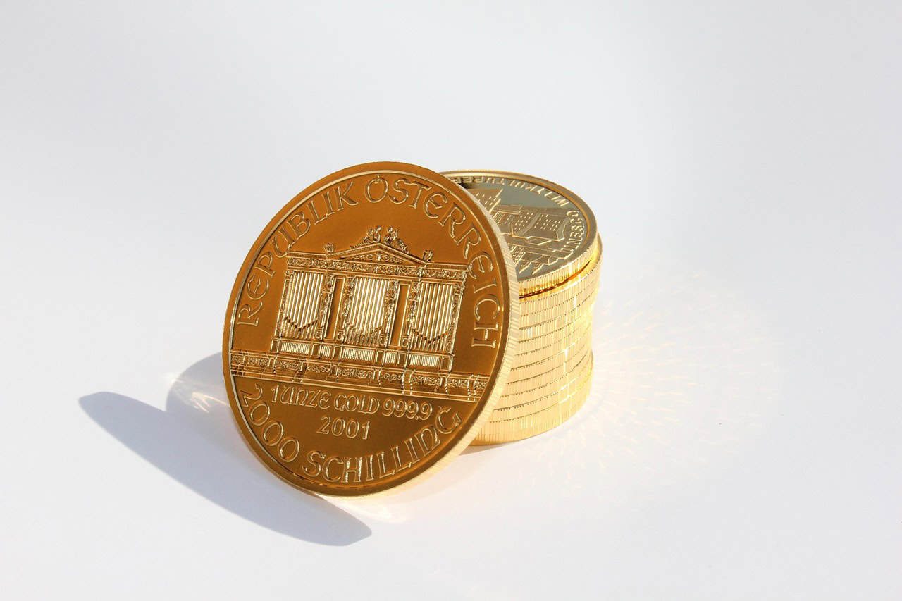 stack of pure gold coins - An Investor’s Guide to Buying Physical Gold Bullion