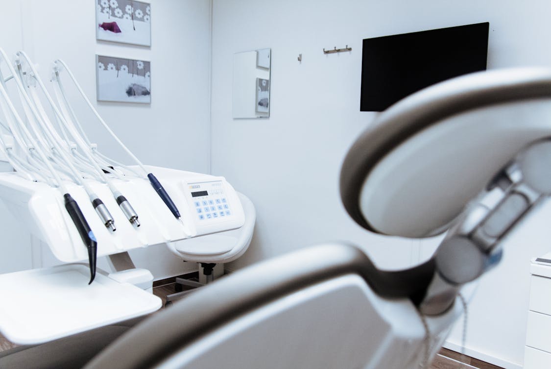 a dental chair - Digital Transformation Strategies for Growing Dental Networks