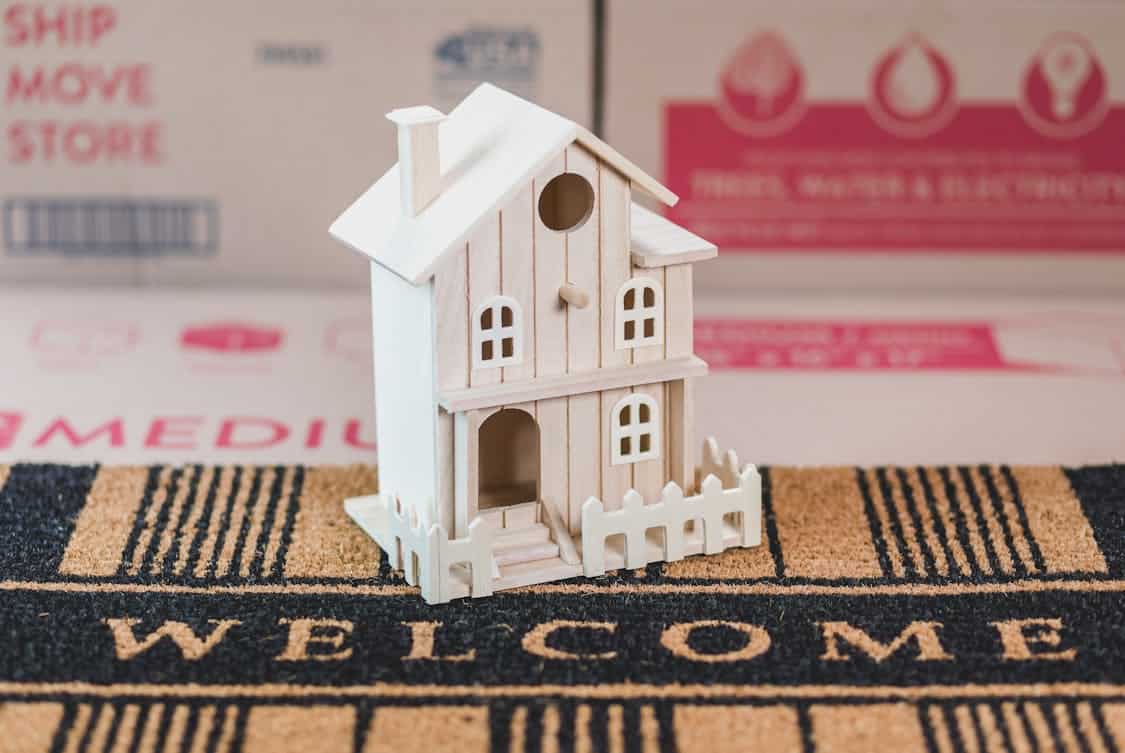 miniature wooden house - 5 Practical Steps to Create a Strong House Building Plan