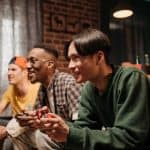 3 guys playing a video game 150x150 - Home