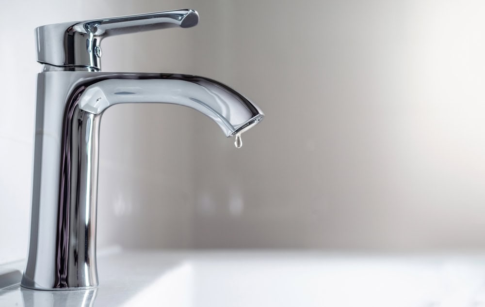 a faucet with leak - Why Is My Faucet Dripping Even When Turned Off? Explained