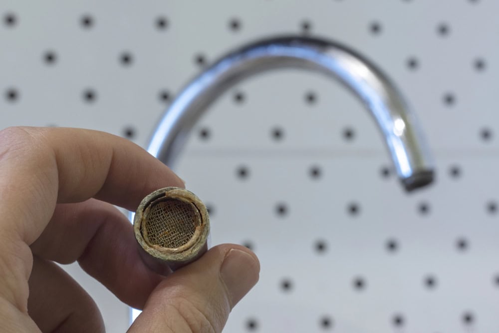 Why Is My Faucet Dripping Even When Turned Off? Explained rusty tap aerator - Why Is My Faucet Dripping Even When Turned Off? Explained