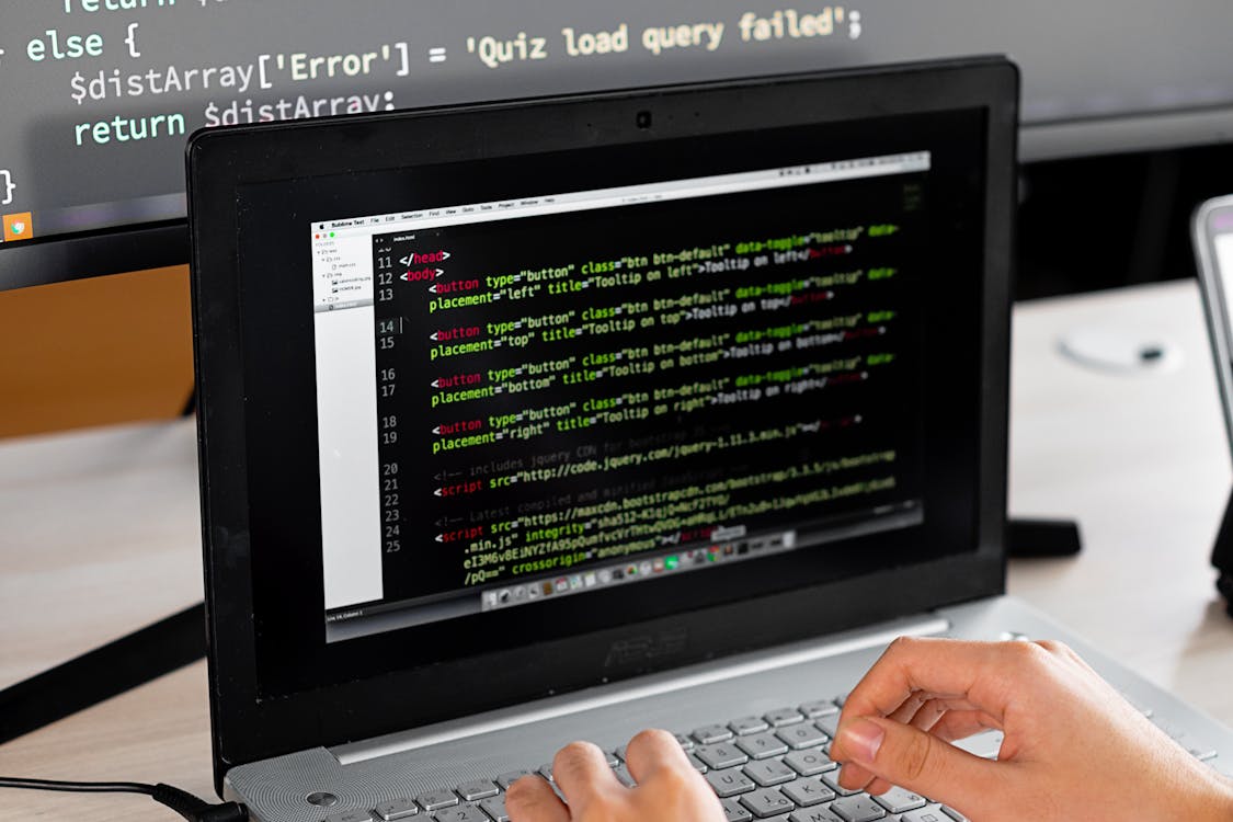 A Person Doing Computer Programming - 5 AI Innovations Every Developer Should Explore Right Now