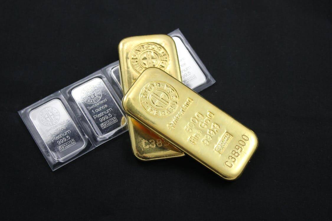 gold and platinum bars - Why Precious Metals Remain the Ultimate Safe Haven Asset