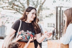 Happy Woman in Black Floral Shirt 300x200 - Happy Woman in Black Floral Shirt