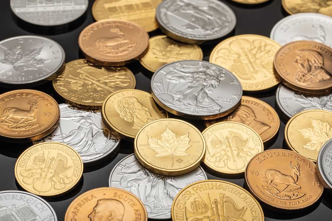 Home a mix of gold and silver coins - Home