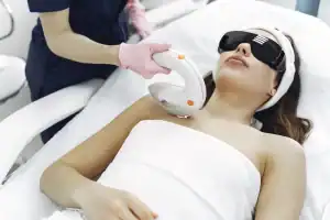 A woman receiving laser therapy 300x200 - A woman receiving laser therapy
