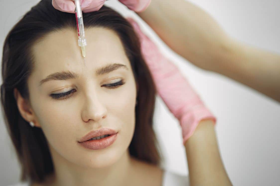 Close up of facial treatment with injection - Australia Just Cracked Down on the Cosmetic Industry. Here's What Changed