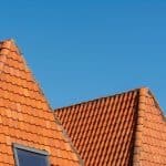 Close up of red tiled roofs 150x150 - Home