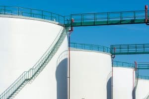 Large industrial storage tanks with a green walkway 300x200 - Large industrial storage tanks with a green walkway