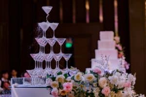 champagne tower with floral decor at a wedding reception 300x200 - champagne tower with floral decor at a wedding reception