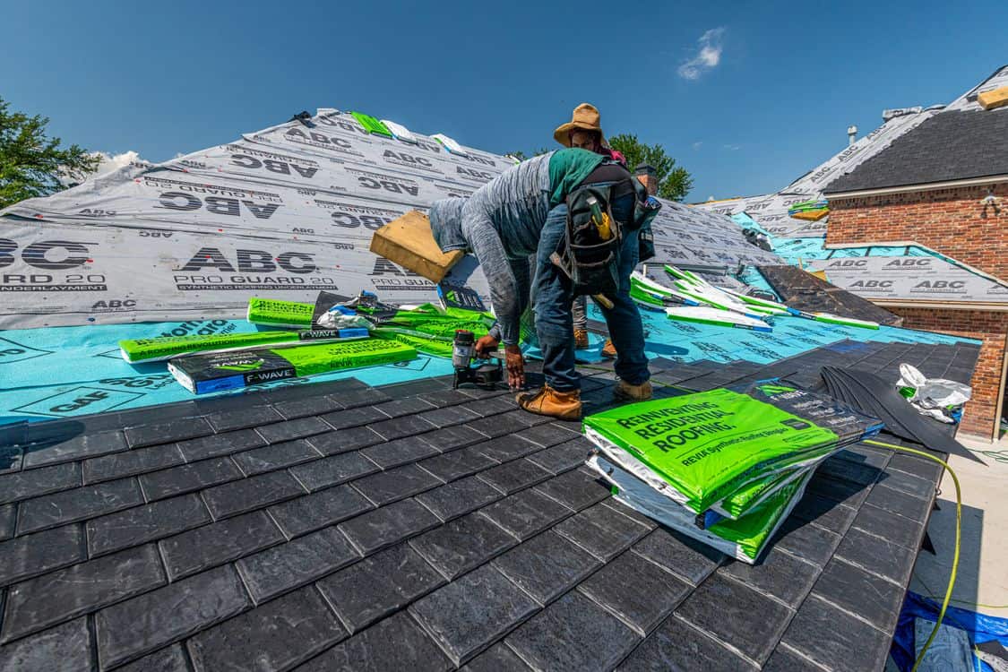Roofers installing roof - Home